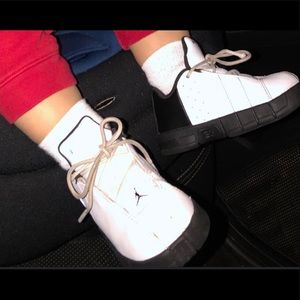 Loved and worn baby Jordan tennis shoes.